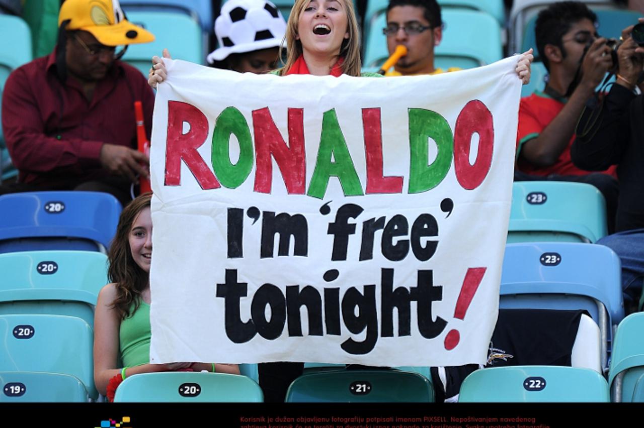 'A Portugal fan holds up a Cristiano Ronaldo sign in the stands prior to kick off Photo: Press Association/Pixsell'