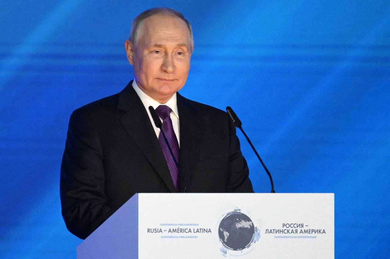Russian President Vladimir Putin delivers a speech during an opening of the Russia-Latin America international parliamentary conference in Moscow