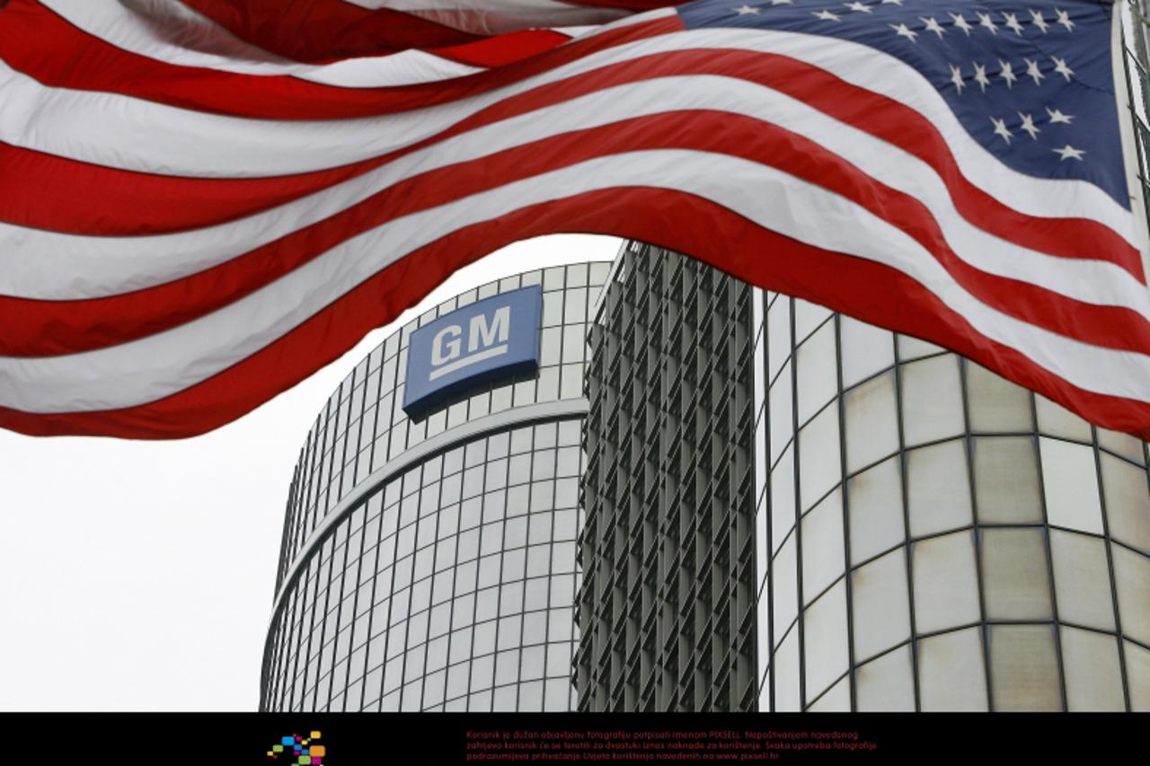 'An American flag flies in front of the General Motors, Global Headquarters in Detroit, Michigan, Monday, June 1, 2009. General Motors Corp. filed for Chapter 11 bankruptcy protection Monday as the ic