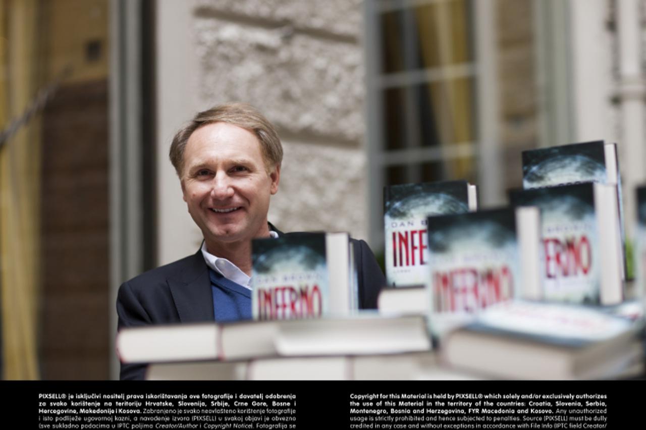 'US writer Dan Brown poses for the camera in Cologne, Germany, 27 May 2013. The publisher Bastei Luebbe based in Cologne and the literature fair lit.COLOGNE present a reading of the book \'Inferno\' w