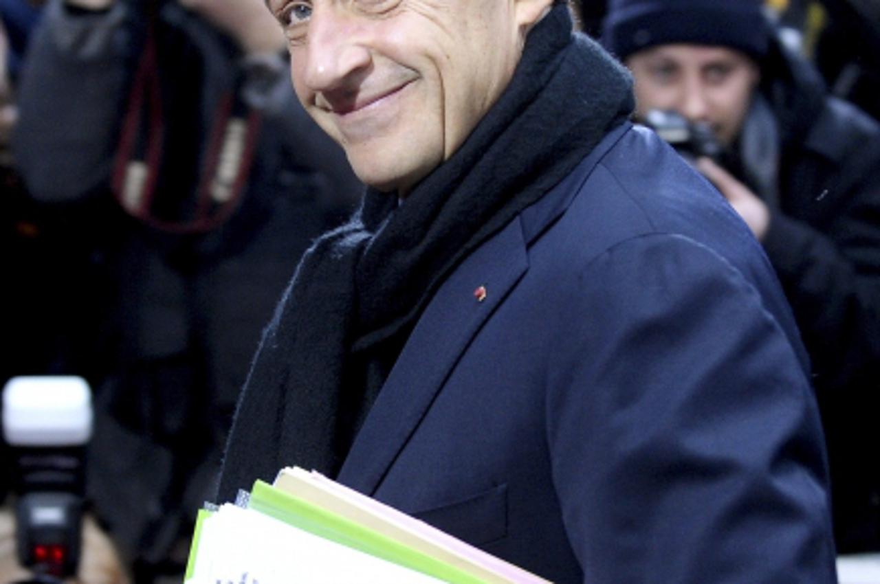'France\'s President Nicolas Sarkozy arrives at the European Union summit in Brussels, October 23, 2011. The EU leaders are meeting to hammer out a comprehensive plan for tackling the euro zone debt c