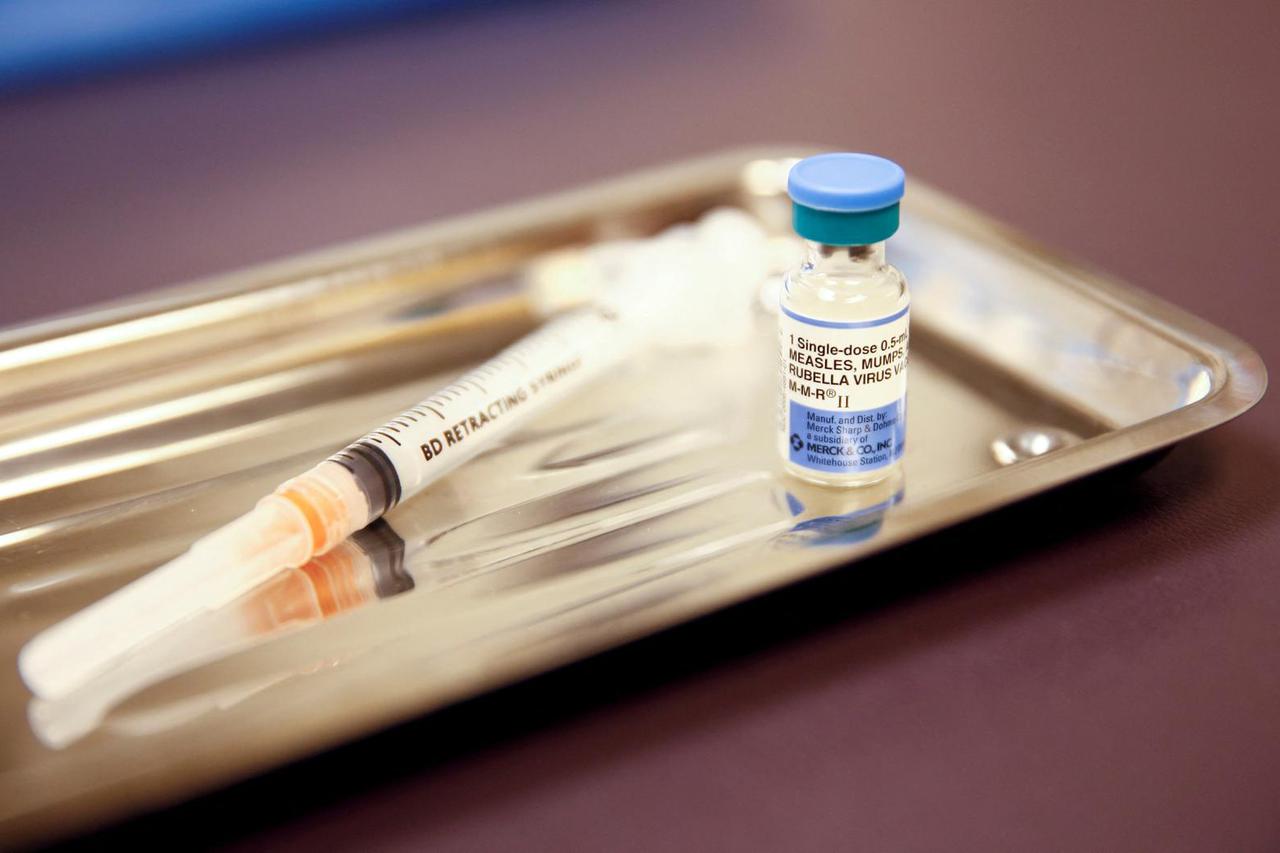 FILE PHOTO: A vial of the measles, mumps, and rubella (MMR) vaccine is pictured at the International Community Health Services clinic in Seattle