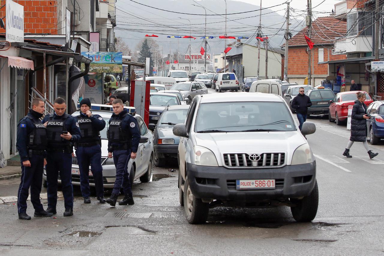 Kosovo police officers patrol in ethnically mixed area in North Mitrovica