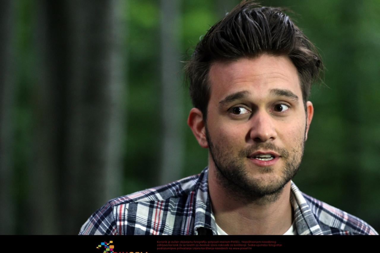 '06.07.2010., Zagreb -  Splitski pjevac Luka Nizetic na Sljemenu je snimio spot za pjesmu Zivot curi. Photo: Jurica Galoic/PIXSELL'