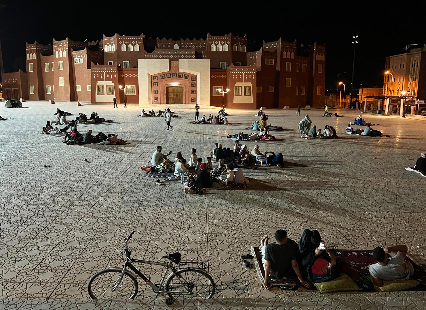 (230909) -- OUARZAZAT, Sept. 9, 2023 (Xinhua) -- This photo taken with a mobile phone shows residents taking shelter at an open space after an earthquake in Ouarzazate, Morocco, Sept. 9, 2023. At least 30 people have been killed in a strong earthquake that jolted Morocco on Friday night, local media reported, adding that the death toll is expected to increase. (Xinhua/Wang Dongzhen) Photo: Wang Dongzhen/XINHUA