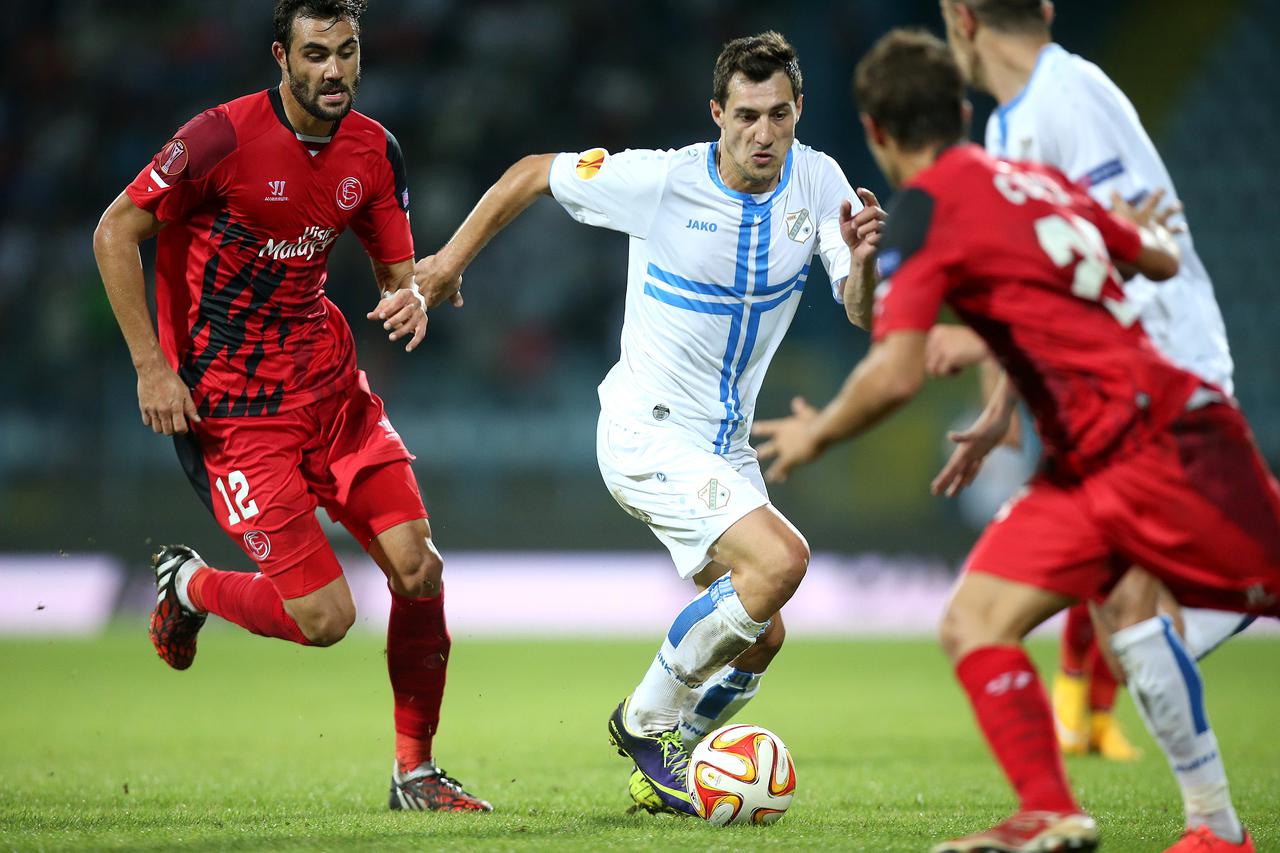 02.10.2014., stadion Kantrida, Rijeka - UEFA Europska liga, skupina G, 02. kolo, HNK Rijeka - Sevilla FC. Mato Jajalo, Vicente Iborra. Photo: Igor Kralj/PIXSELL