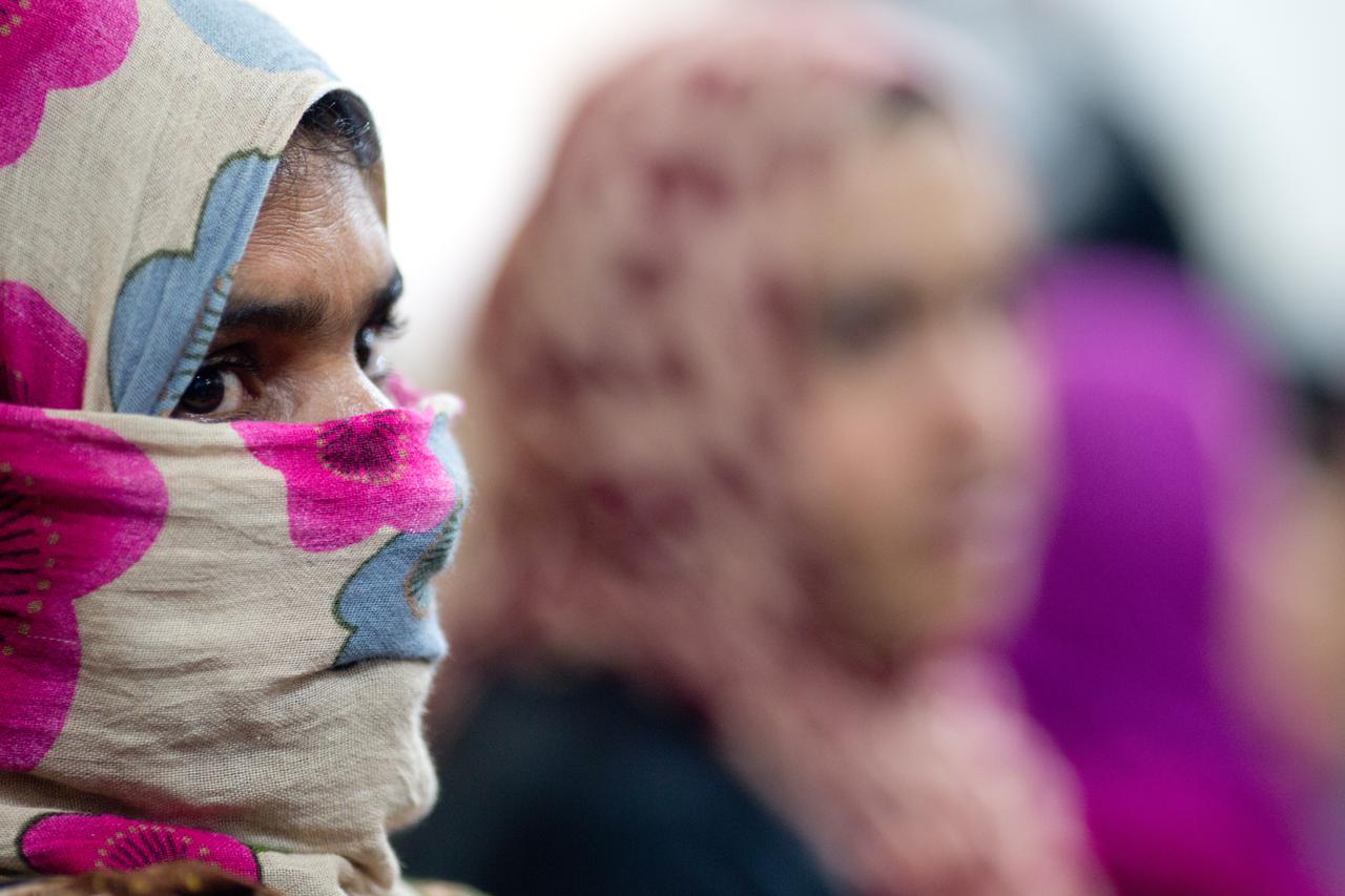 A veiled woman attends an address at the Bourj Barajneh Camp for Syrian and Palestinian refugees near Beirut, Lebanon, 22 December 2012. German Minister of Economic Cooperation and Development Dirk Niebel visits the camp. The German government spends an o