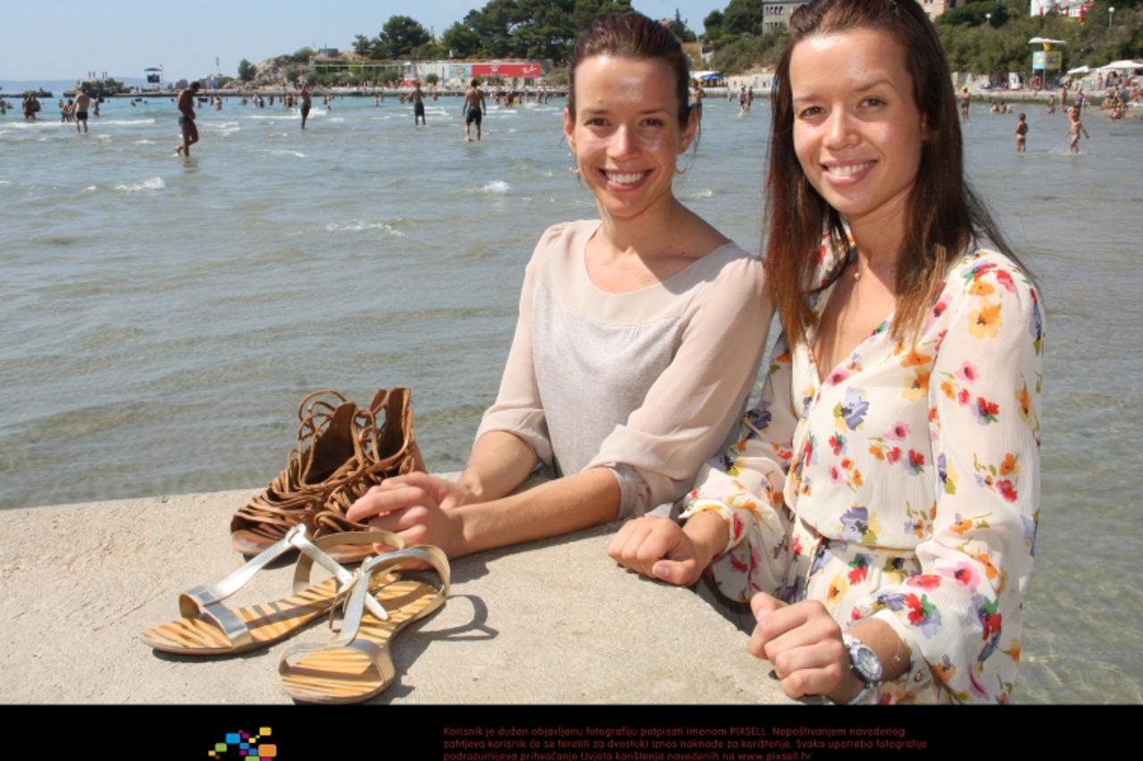 '16.08.20125., Split - Sestre Ana i Lucija Zaninovic nakon povratka s Olimpijskih igara, na kojima je Lucija osvojila broncanu medalju u taekwondou (kategorija do 49kg), prosetale su Bacvicama.  Photo