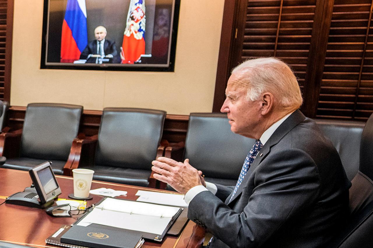 FILE PHOTO: U.S. President Joe Biden holds secure video call with Russia's President Vladimir Putin from the White House in Washington