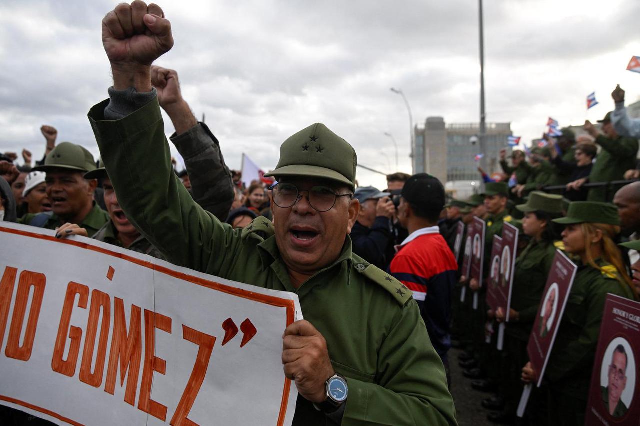 Cubans march outside U.S. embassy for soldiers killed in US attack on Venezuela, in Havana