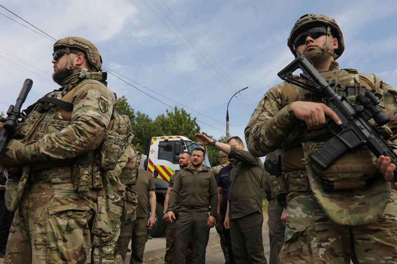 Ukraine's President Zelenskiy visits flooded Kherson