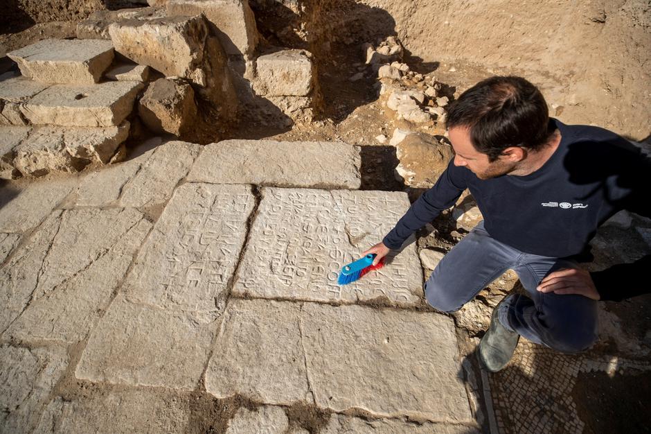 Israeli archaeologist David Yeger from the Israel Antiquities Authority, shows the remains of a previously unknown church that was founded at the end of the Byzantine period at the Garden of Gethsemane church in Jerusalem