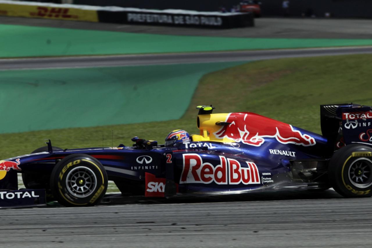 'Red Bull Formula One driver Mark Webber of Australia drives during the Brazilian F1 Grand Prix at the Interlagos circuit in Sao Paulo November 27, 2011. REUTERS/Ricardo Moraes (BRAZIL - Tags: SPORT M