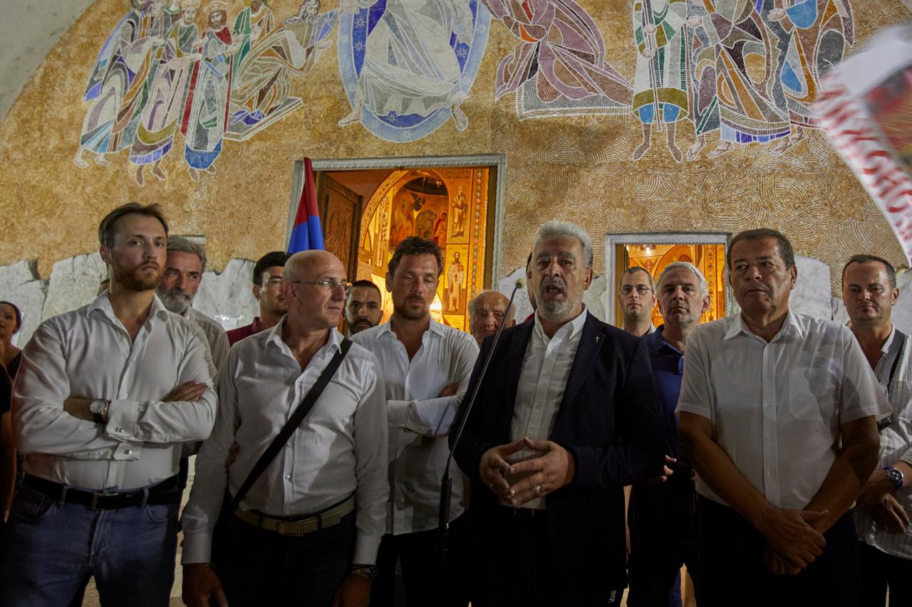 Zdravko Krivokapic speaks to his supporters in front of the Cathedral of the Resurrection of Christ in Podgorica