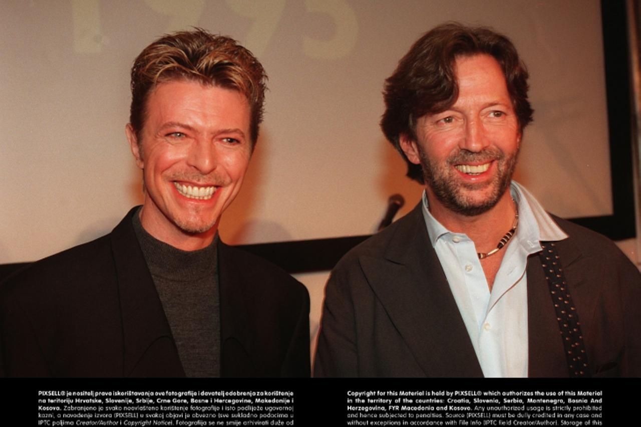 'ROCK LEGENDS DAVID BOWIE ( LEFT) AND ERIC CLAPTON AT THE 1995 Q MUSIC AWARDS IN LONDONPhoto: Press Association/PIXSELL'