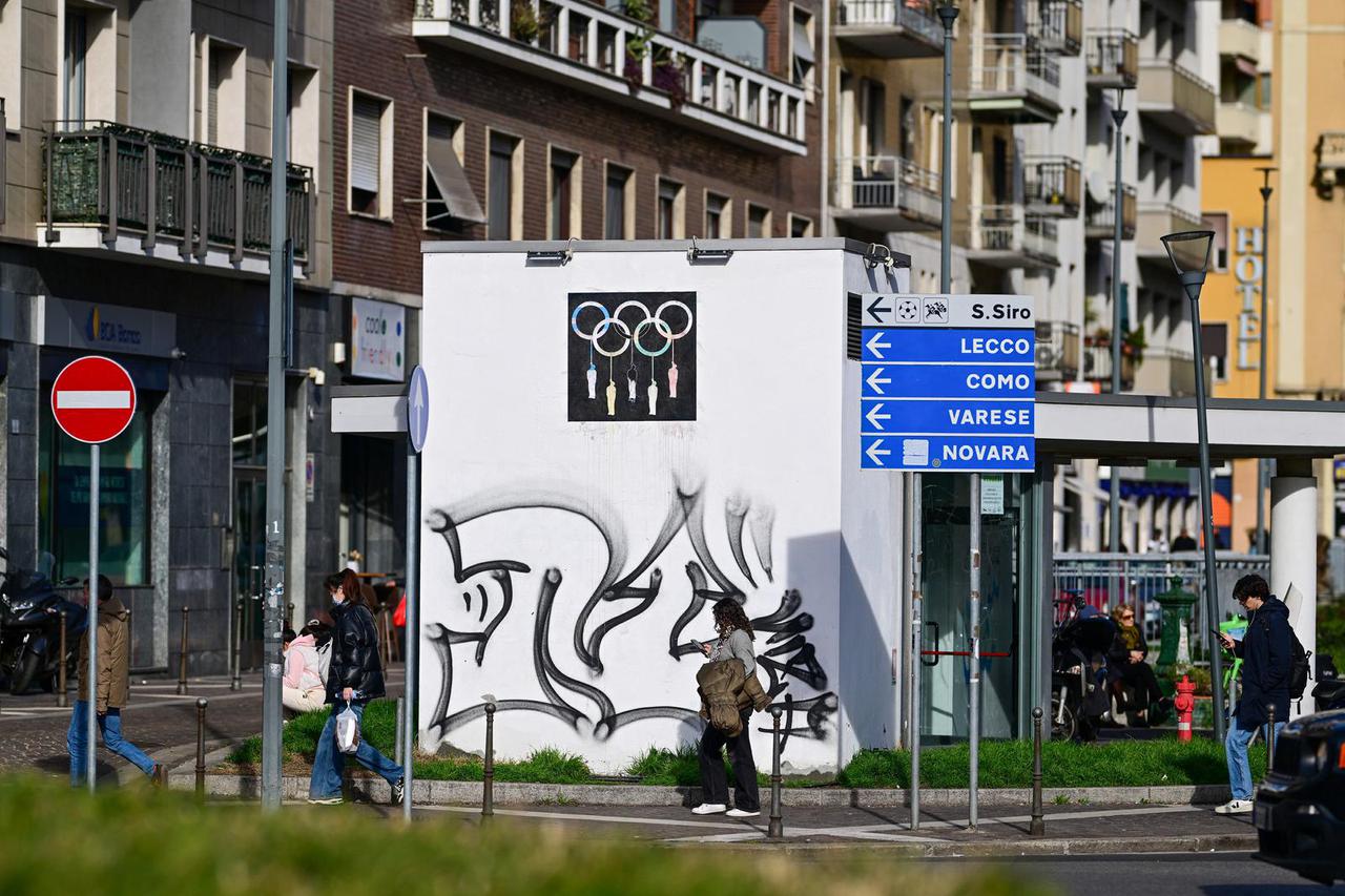 A stencil depicting Olmypic rings is displayed in Milan, Italy