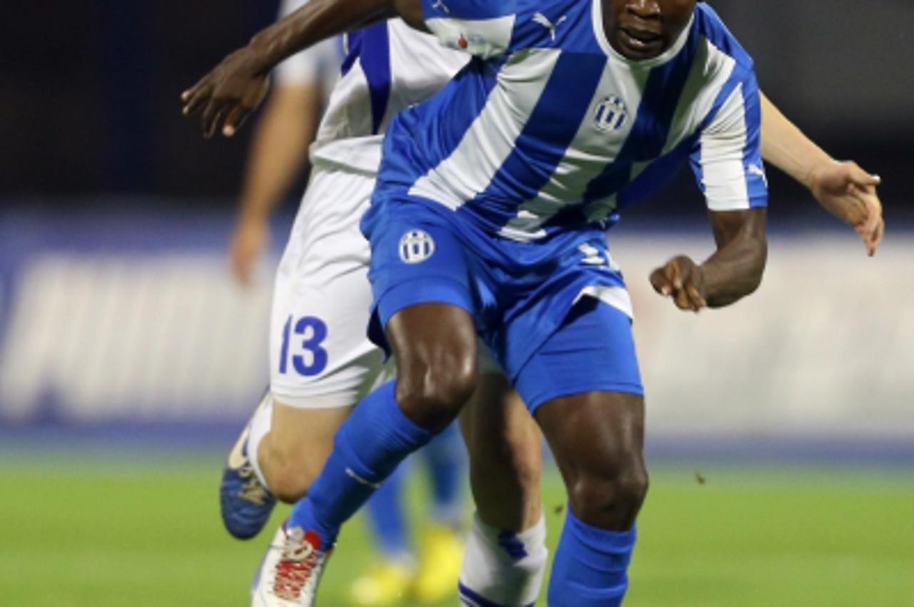 '03.05.2013., stadion u Maksimiru, Zagreb - MAXtv 1. HNL, 30. kolo, NK Lokomotiva - NK Osijek. Mathias Chago i Marko Leskovic.  Photo: Jurica Galoic/PIXSELL'