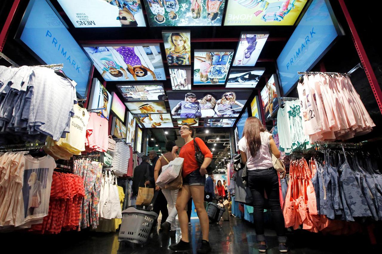 FILE PHOTO: Customers shop at a Primark store on Oxford Street in London