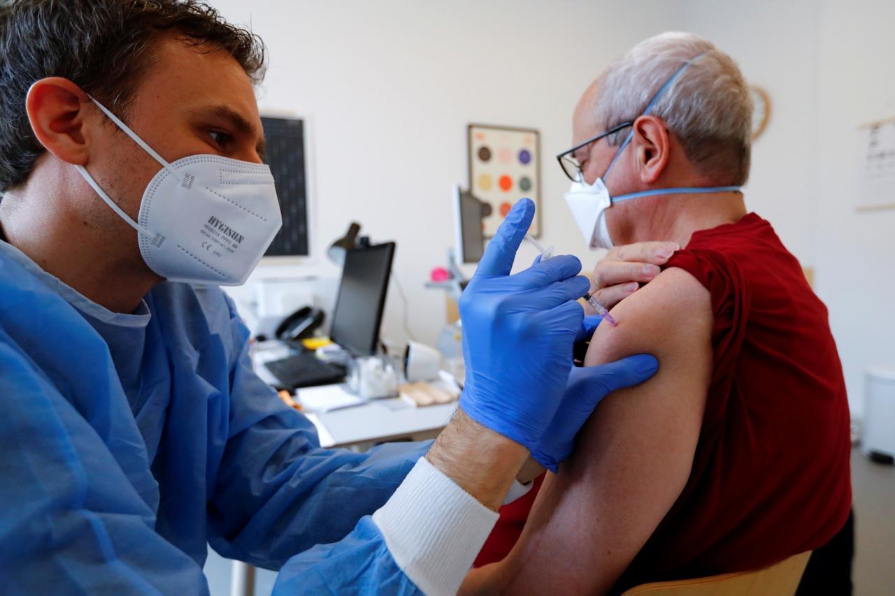 General practitioner vaccinates dose of the AstraZeneca coronavirus disease (COVID-19) vaccine in a doctors practice in Berlin