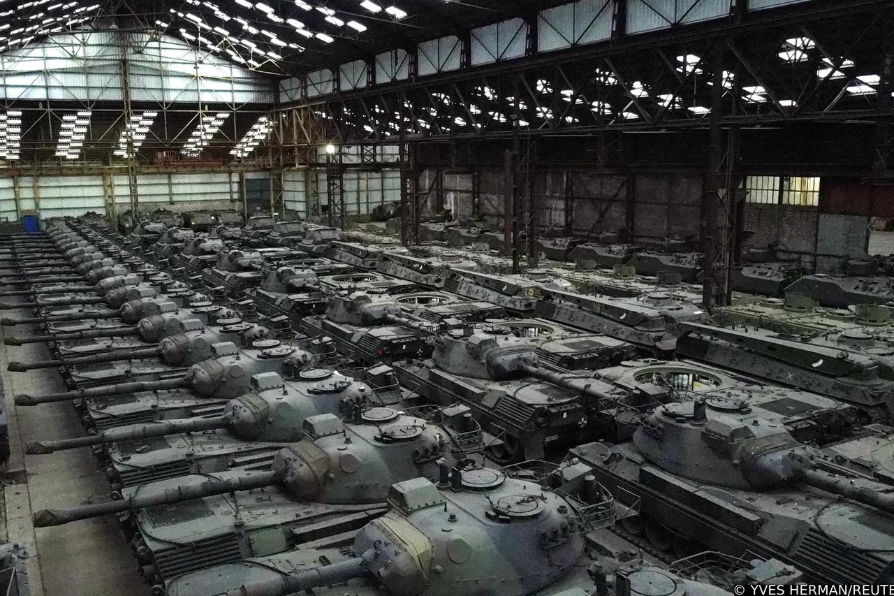 Dozens of German-made Leopard 1 tanks are seen in an hangar in Tournais