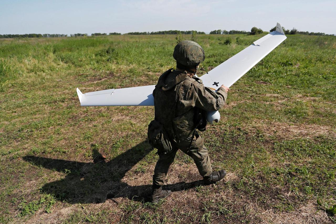 Russian service members launch an unmanned aerial vehicle near Popasna