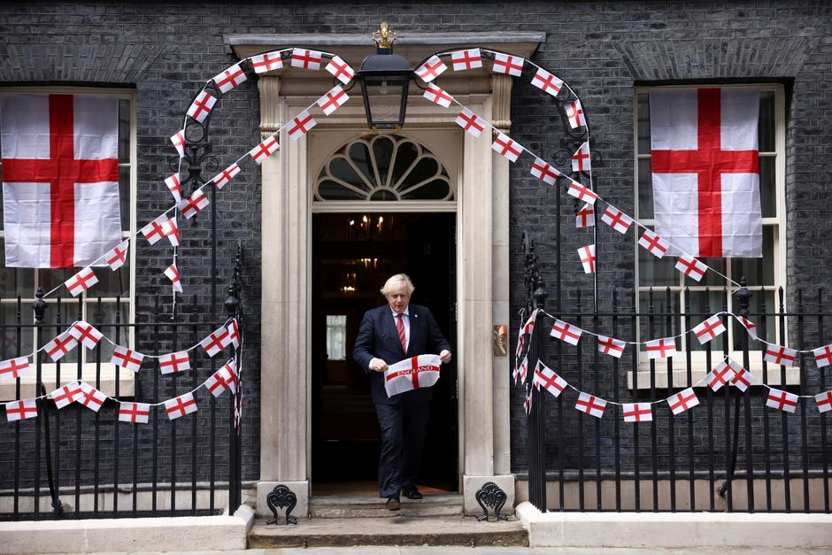 Britain's Boris Johnson at Downing Street with flags ahead of the Euro 2020 final