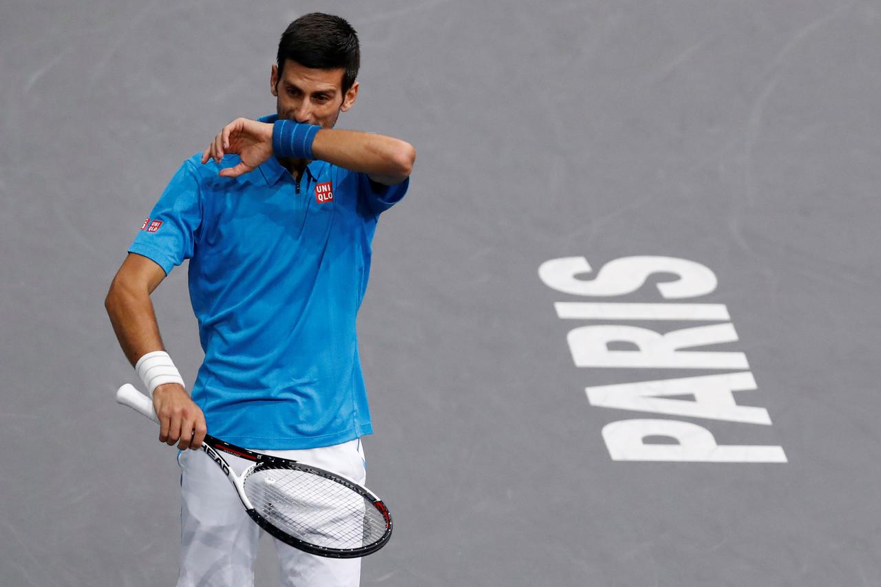 Tennis - Paris Masters tennis tournament men's singles quarterfinals - Novak Djokovic of Serbia v Marin Cilic of Croatia - Paris, France - 4/11/2016 - Djokovic reacts. REUTERS/Gonzalo Fuentes