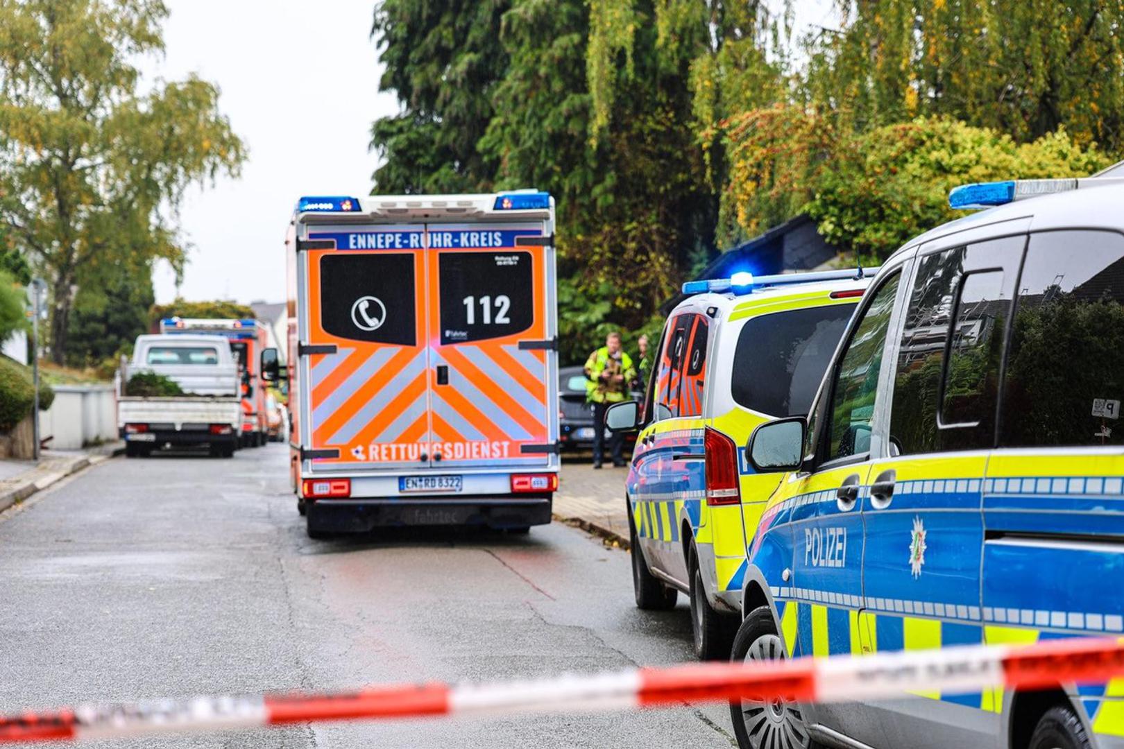 dpatop - 07 October 2025, Herdecke: An ambulance stands in front of police cars on a street. The newly elected mayor of Herdecke, Iris Stalzer (SPD), has been found critically injured in her apartment. She had been stabbed several times, according to security sources. (to dpa: "Stabbed: New mayor of Herdecke injured") Photo: Alex Talash/dpa Photo: Alex Talash/DPA
