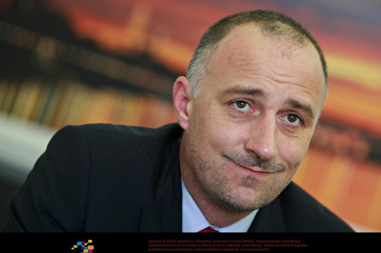 '04. 04. 2012., Zagreb - Ministarstvo graditeljstva i prostornog uredjenja. Ivan Vrdoljak, ministar graditeljstva. Photo: Davor Puklavec/PIXSELL '