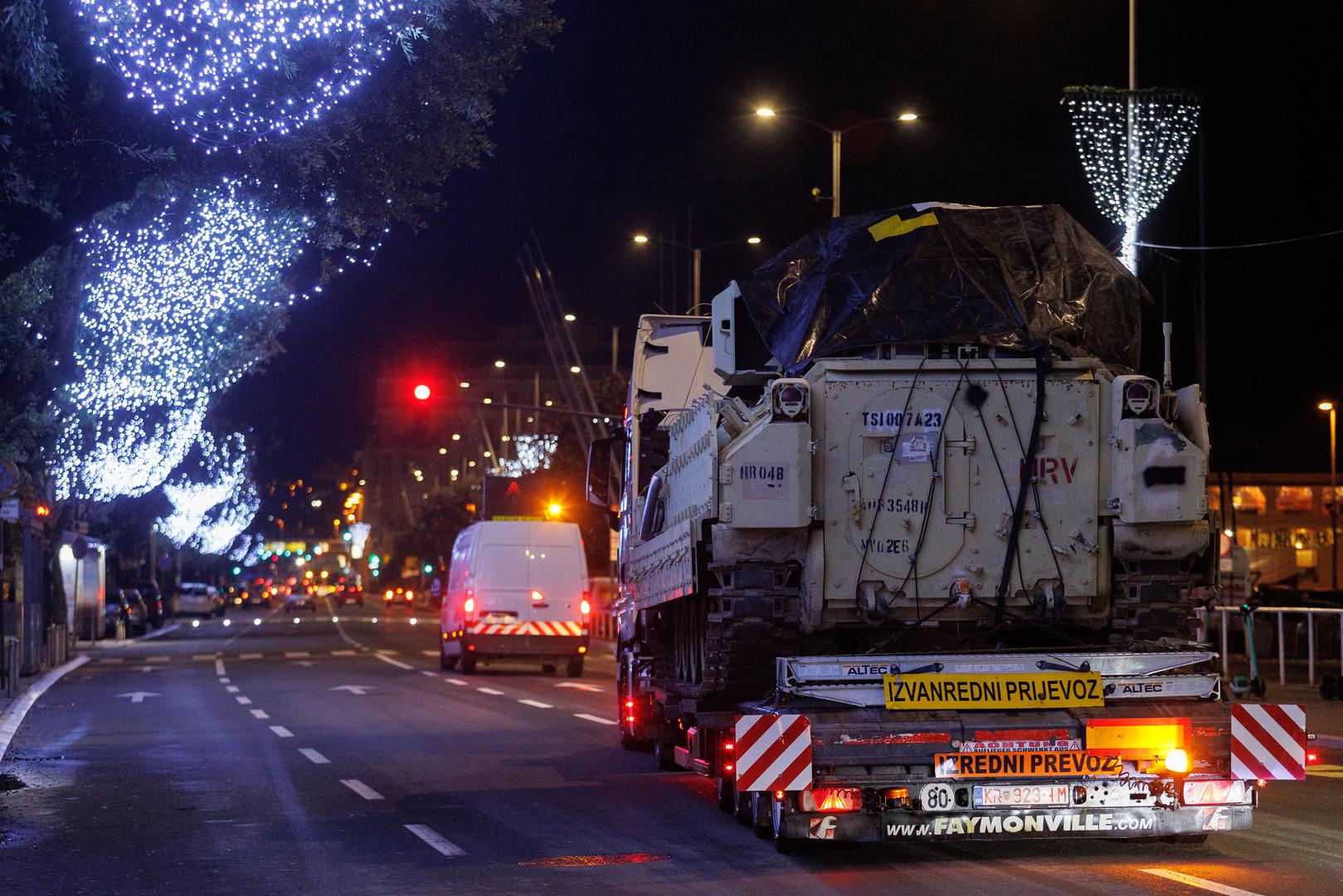 10.12.2023, Rijeka -  Konvoj sastavljen od sedam kamiona i 22 Bradleya krenuo iz rijecke luke prema Slavonskom Brodu.  Photo: Nel Pavletic/PIXSELL