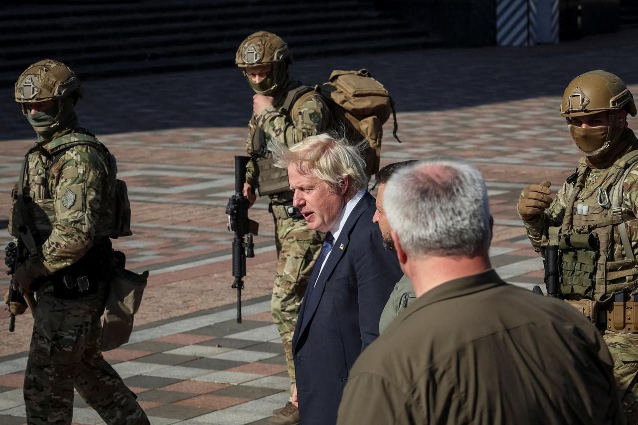 Ukraine's President Zelenskiy awards British Prime Minister Johnson walk in central Kyiv