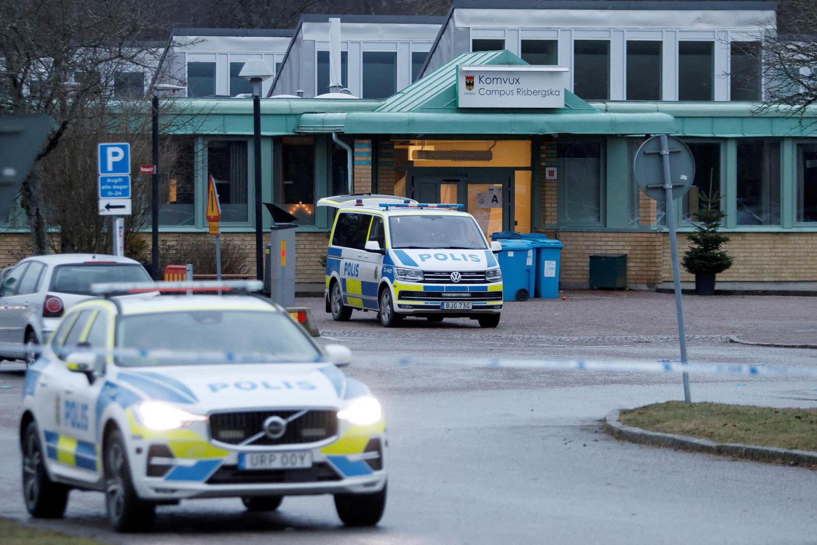 Police vehicles park near the Risbergska school, following a deadly shooting attack at the adult education center in Orebro, Sweden, February 5, 2025. REUTERS/Kuba Stezycki Photo: Kuba Stezycki/REUTERS