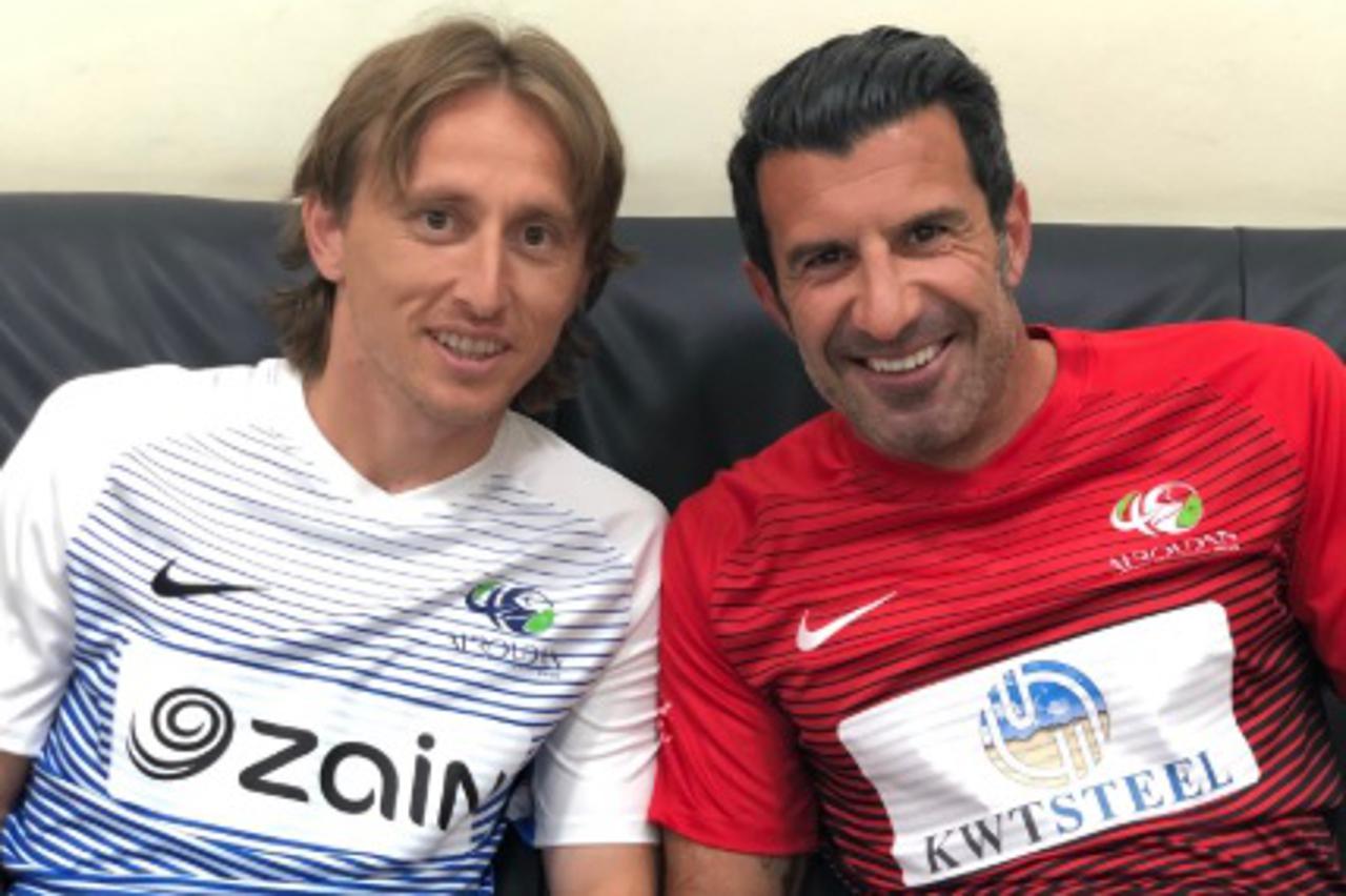 Luka Modrić i Luis Figo