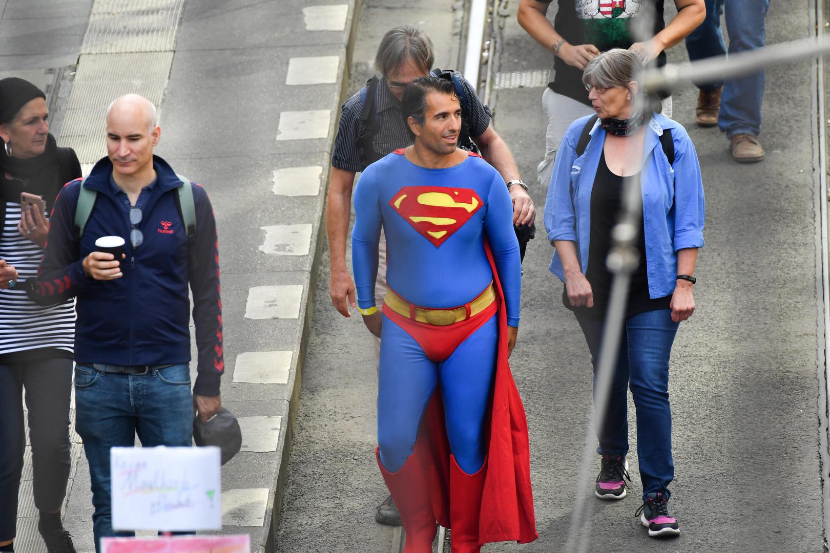 29 August 2020, Berlin: A participant in a Superman costume is walking in Friedrichstraße during a demonstration against the Corona measures. Photo: Paul Zinken/dpa /DPA/PIXSELL