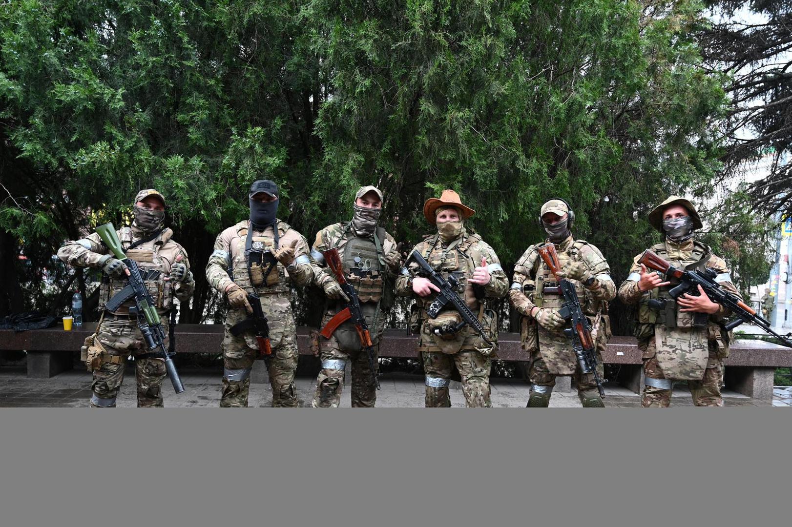 Fighters of Wagner private mercenary group pose for a picture as they get deployed near the headquarters of the Southern Military District in the city of Rostov-on-Don, Russia, June 24, 2023. REUTERS/Stringer Photo: Stringer/REUTERS