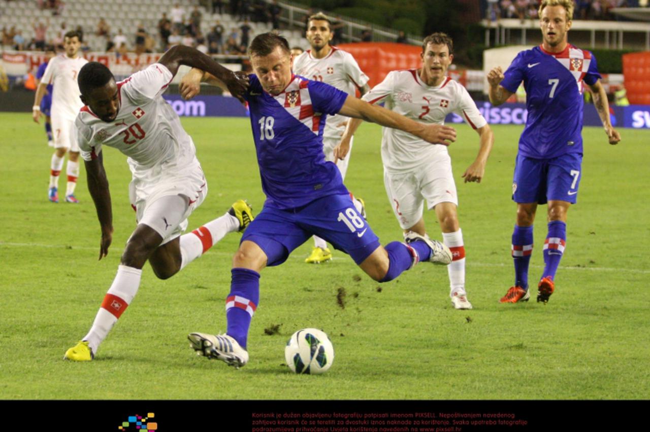 '15.08.20125., Split, Croatia - Football match, Croatia - Switzerland. Friendly match on the occasion of anniversary celebrations of 100 years of Croatian Football Federation. Ivica Olic, Djourou. Pho