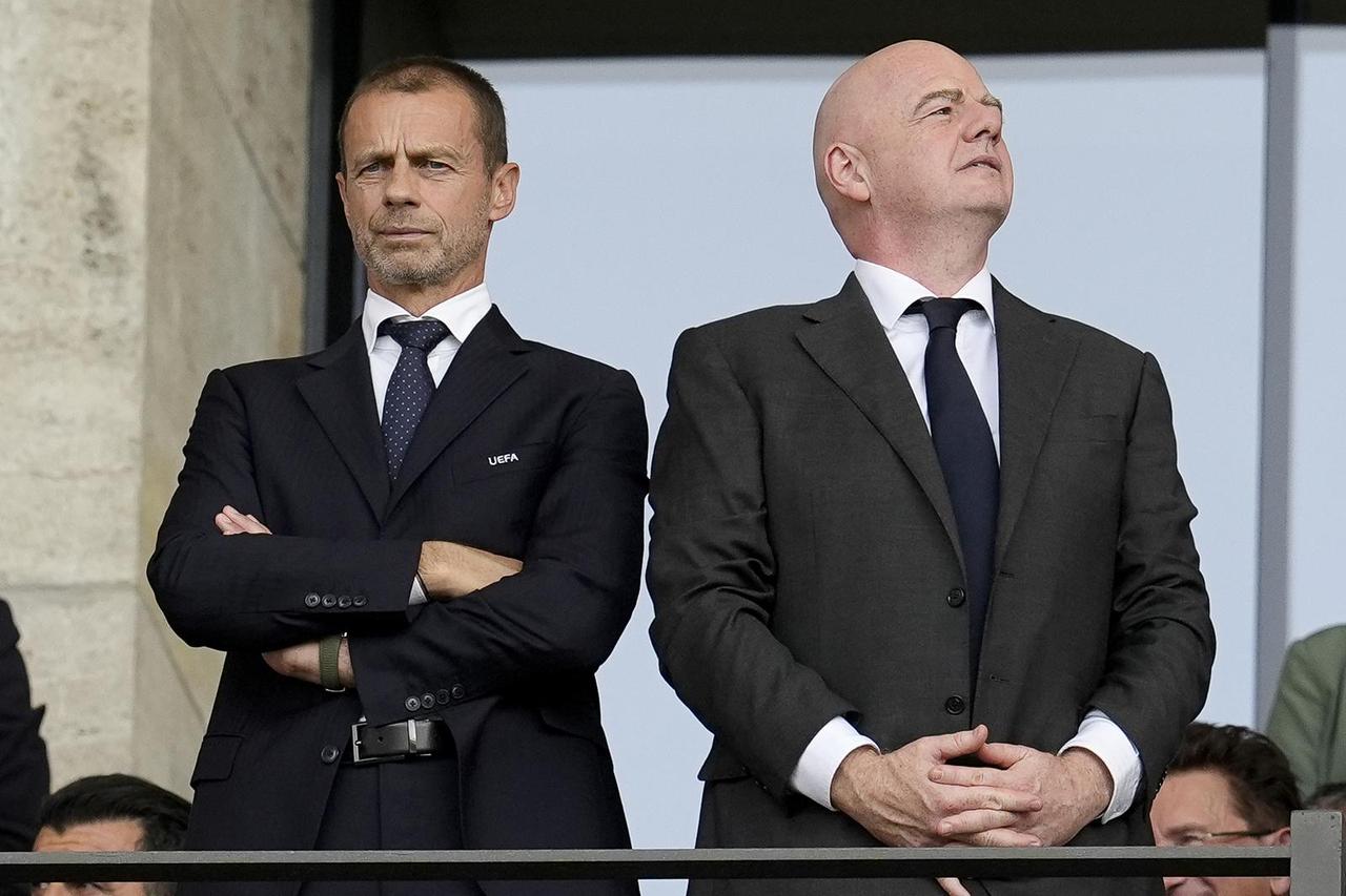 Aleksander Ceferin and Gianni Infantino file photo