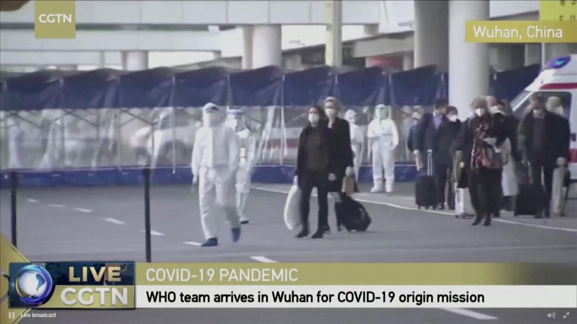 Still image of WHO team tasked with investigating the origins of the coronavirus disease (COVID-19) pandemic arriving at Wuhan Tianhe International Airport Members of the World Health Organisation (WHO) team tasked with investigating the origins of the coronavirus disease (COVID-19) pandemic arrive at Wuhan Tianhe International Airport in Wuhan, Hubei province, China, January 14, 2021, in this still image taken from video provided by CGTN. CGTN/via REUTERS TV  ATTENTION EDITORS - THIS IMAGE HAS BEEN SUPPLIED BY A THIRD PARTY. NO RESALES. NO ARCHIVES. CHINA OUT. CGTN