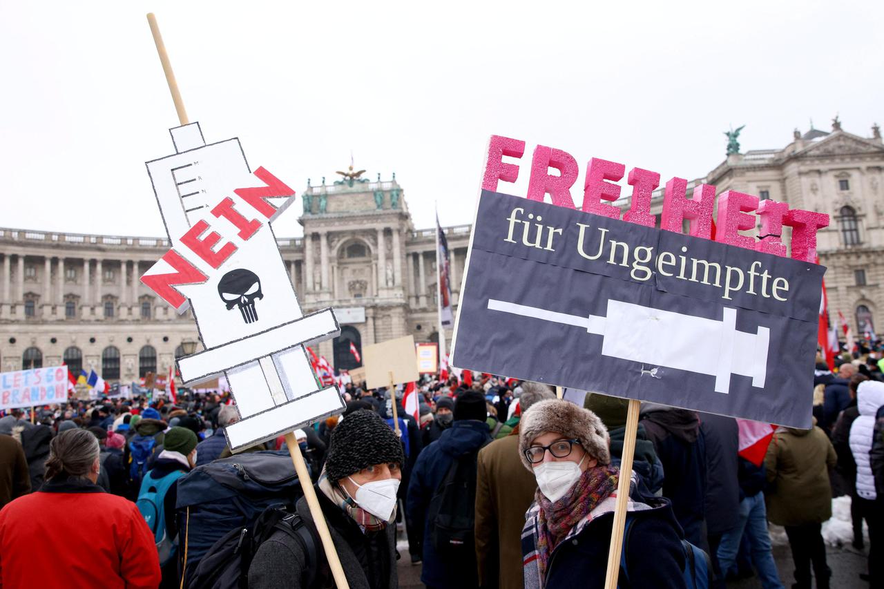 People protest against coronavirus restrictions and the vaccine mandate in Vienna