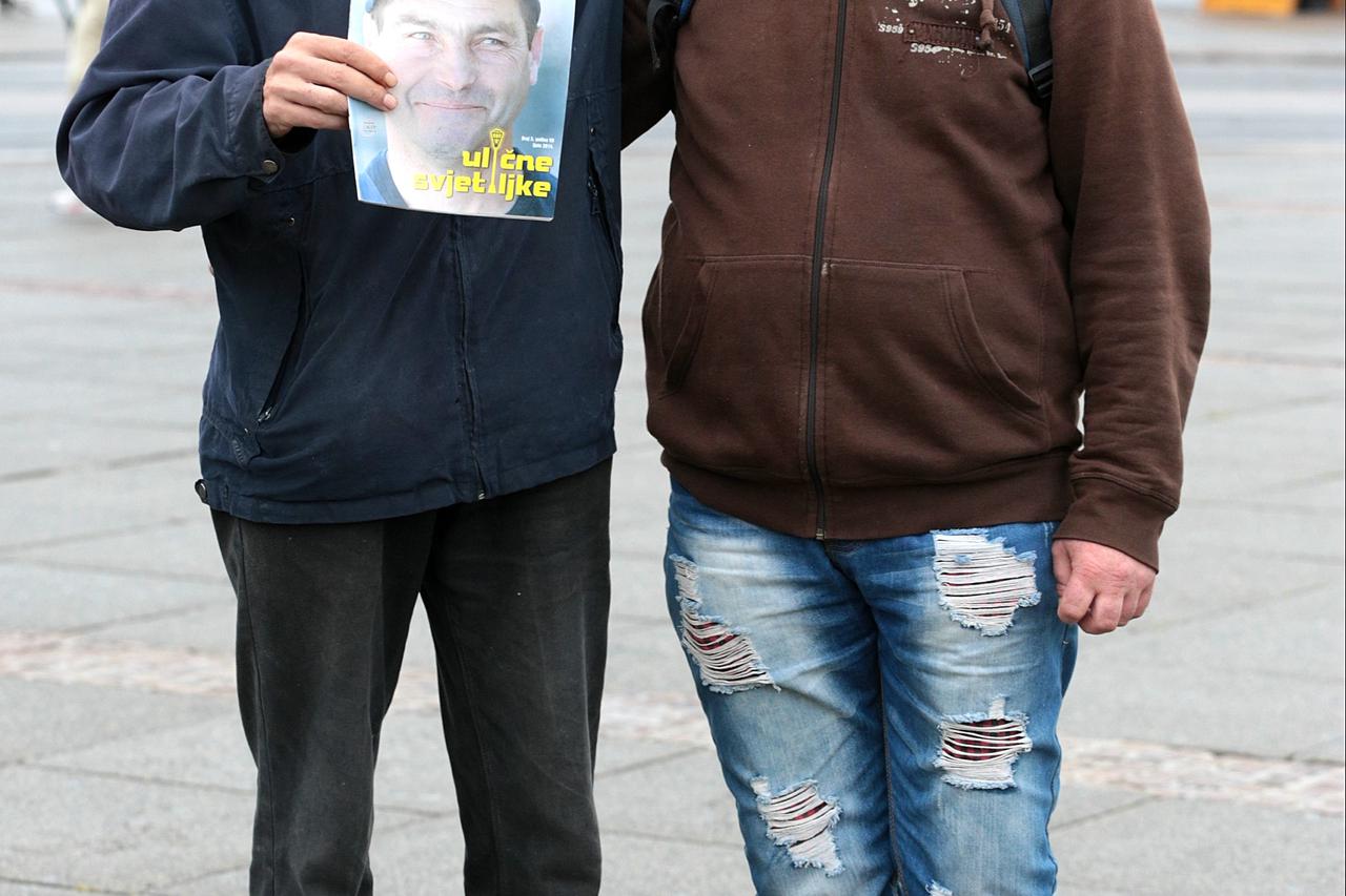 01.09.2014., Zagreb - Mile Mrvalj i Zeljko Benic beskucnici koji prodaju casopis Ulicne svjetiljke. Photo: Zarko Basic/PIXSELL
