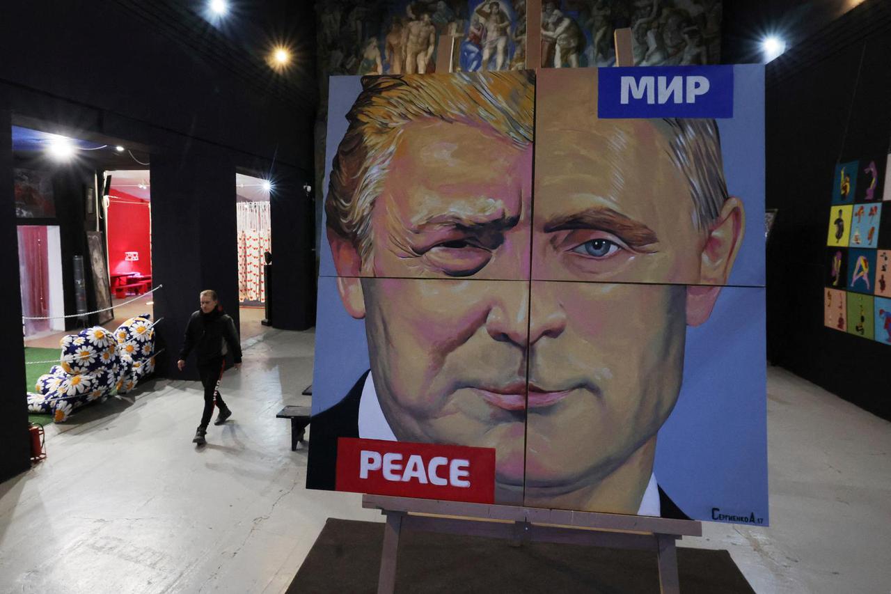 Painting showing a combination of faces of Russian President Vladimir Putin and U.S. President Donald Trump is on display in a gallery in Saint Petersburg