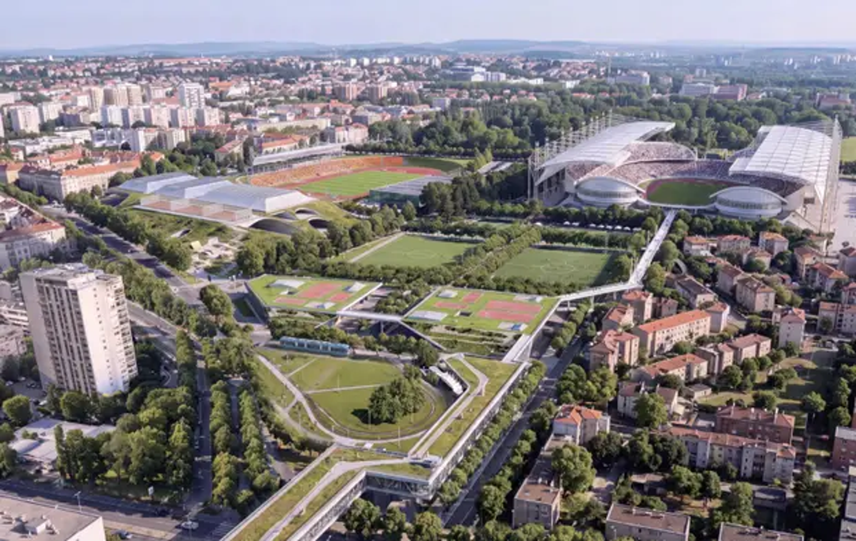 Četiri odvojena tribinska sektora razmaknuta su na glavnim osima stadiona, a natkrivaju ih lagane tekstilne membrane razapete s visokih obodnih jarbola. Lučni ostakljeni volumeni i javni sadržaji u podnožju otvaraju stadion prema parku i okolnim ulicama. U anketnom dijelu gradska mreža povezuje atletski stadion i dvorane uklopljene u zeleni teren s izduženim pješačkim koridorom prema Borongaju.