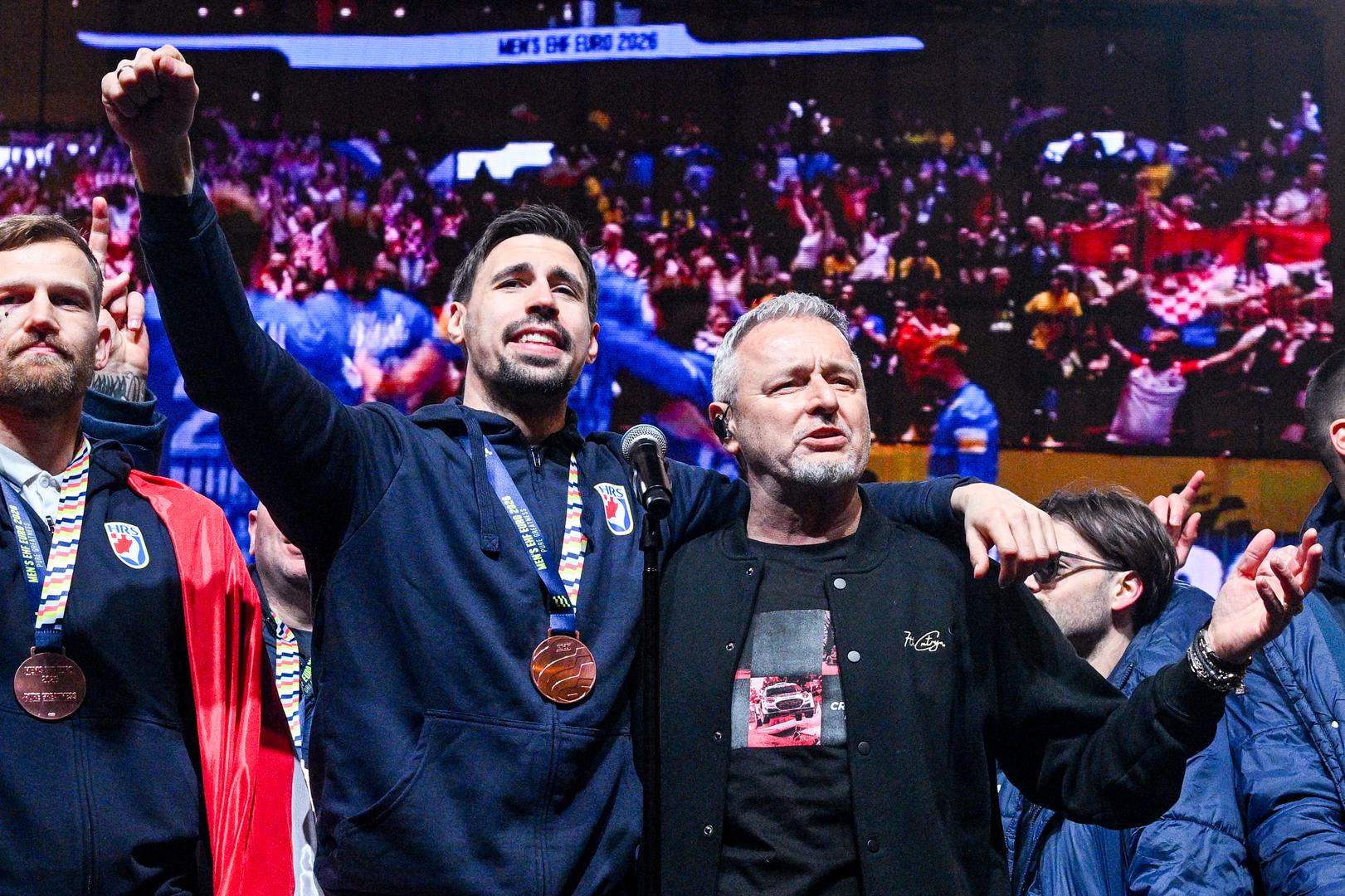 02.02.2026., Zagreb - Svecani docek hrvatske rukometne reprezentacije u na Trgu bana Josipa Jelacica nakon osvojene broncane medalje na Europskom rukometnom prvenstvu. David Mandic, Ivan Martinovic, Marko Perkovic Thompson i Filip Glavas Photo: Davor Puklavec/PIXSELL