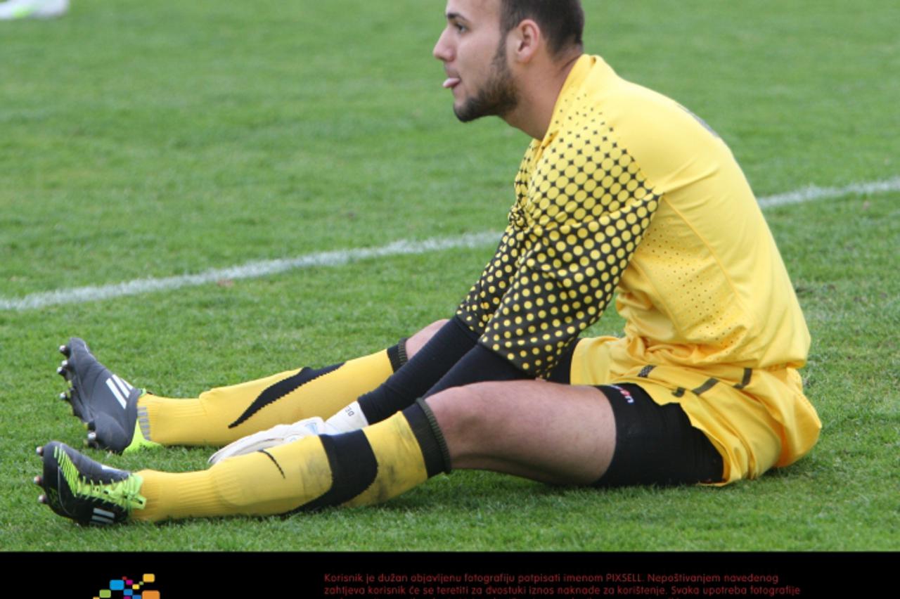 '28.03.2011., Stadion Park mladezi, Split - Prijateljska nogometna utakmica mlade U-21 reprezentacije Hrvatske i Madjarske. Vratar Matej Delac nakon primljenog gola. Photo: Ivo Cagalj/PIXSELL'