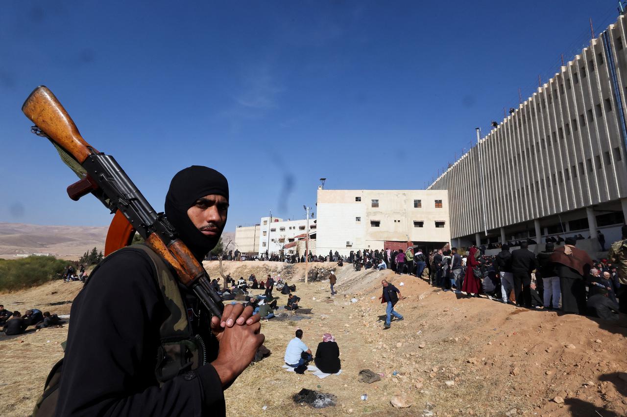 People search for prisoners at Sednaya prison