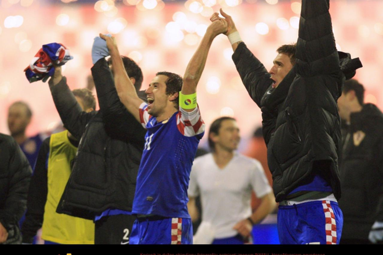 \'15.11.2011., stadion u Maksimiru, Zagreb - Uzvratna utakmica dokvalifikacija za Euro 2012., Hrvatska - Turska. Darijo Srna, Mario Mandzukic slave.  Photo: Danijel Berkovic/PIXSELL\'