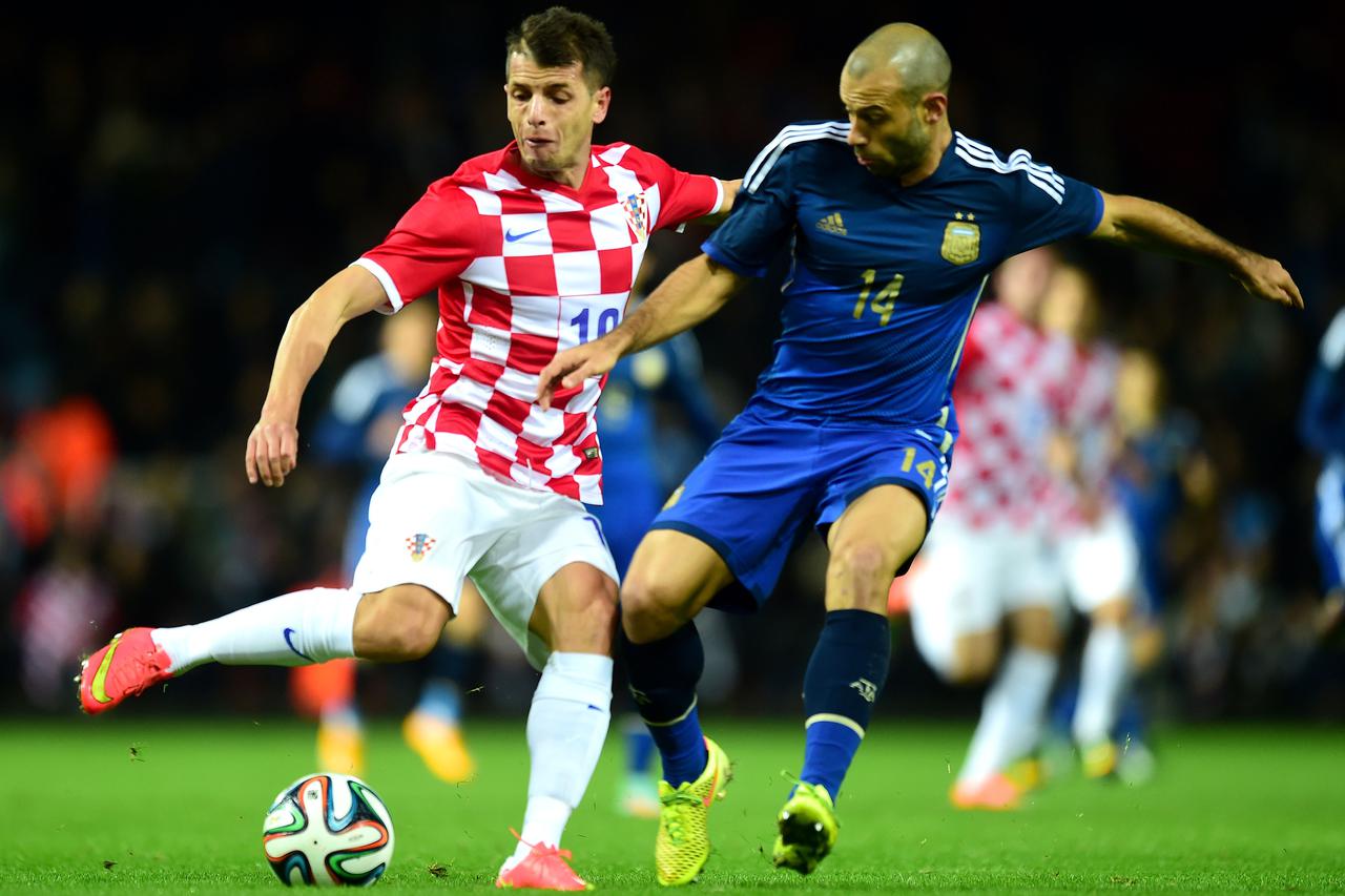 Soccer - International Friendly - Argentina v Croatia - Upton ParkArgentina's Javier Mascherano and Croatia's Anas Sharbini battle for the ballAdam Davy Photo: Press Association/PIXSELL