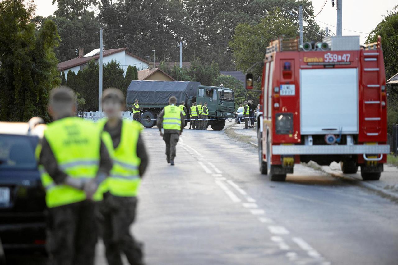 Soldiers patrol the street after a suspected Russian drone was shot down after intrusions into Polish airspace, in Wyryki municipality
