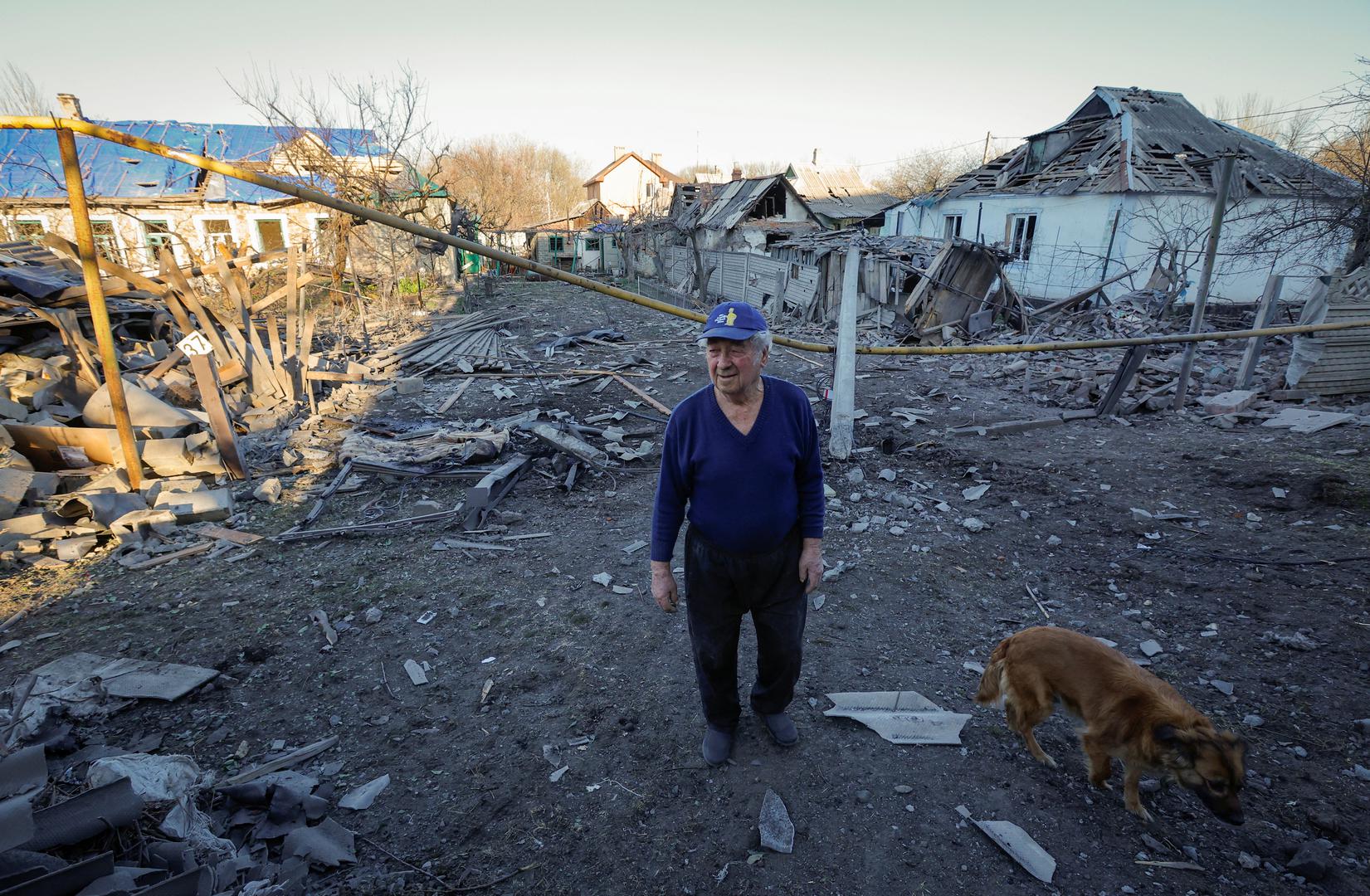 Viktor Chernikov, 84, stands on a street next to houses, which were damaged during a recent shelling in the course of the Russia-Ukraine conflict, in Donetsk, Russian-controlled Ukraine, April 6, 2024. REUTERS/Alexander Ermochenko Photo: Alexander Ermochenko/REUTERS