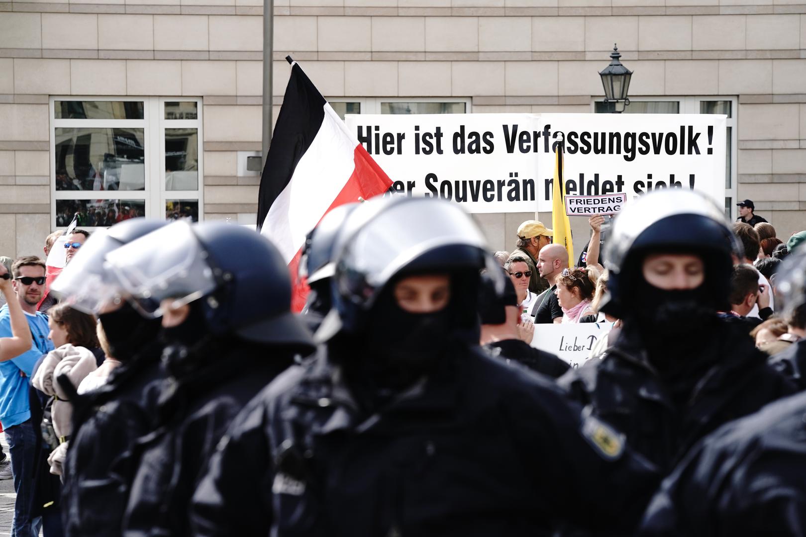29 August 2020, Berlin: Participants gather behind police officers for a demonstration against the Corona measures. Photo: Kay Nietfeld/dpa /DPA/PIXSELL